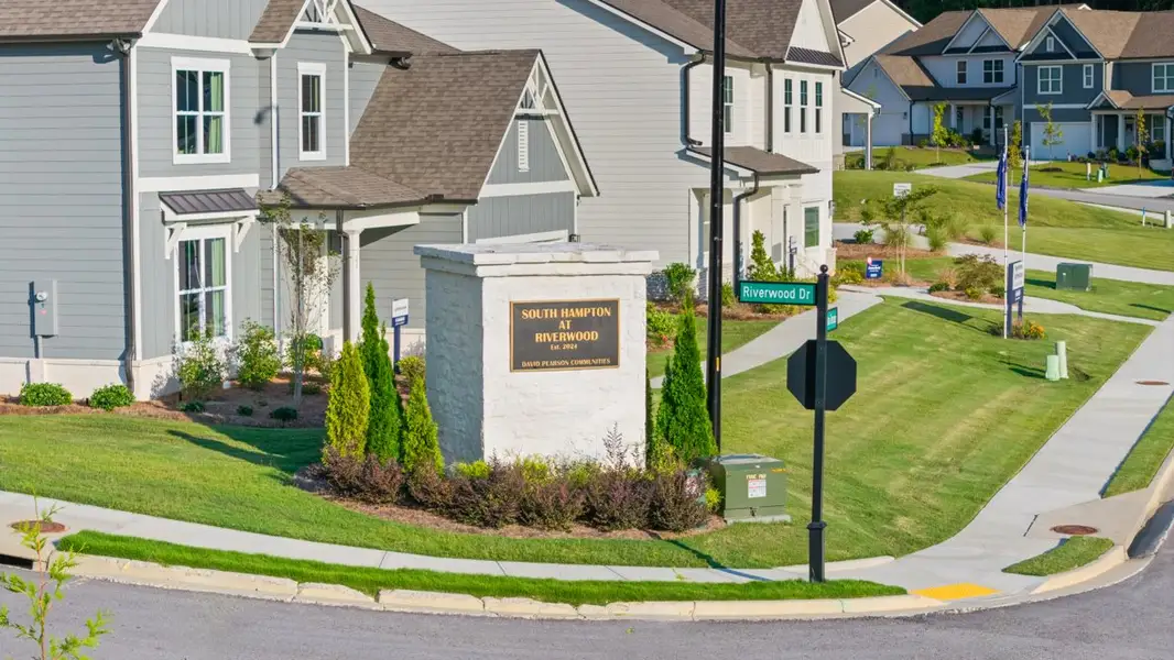 Entrance to the Hamptons at Riverwood South community in Dallas, GA, featuring signage and landscaping (Image 2).
