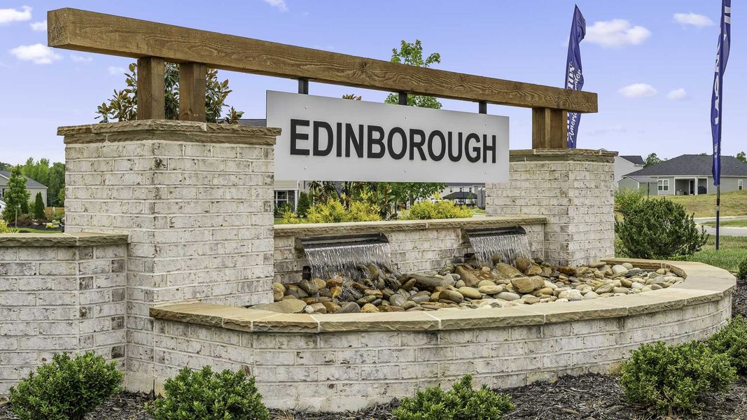 Entrance to the Edinborough community in Gibsonville, NC, featuring signage and landscaping (Image 1). Entrance to the Edinborough community in Gibsonville, NC, featuring signage and landscaping (Image 1).