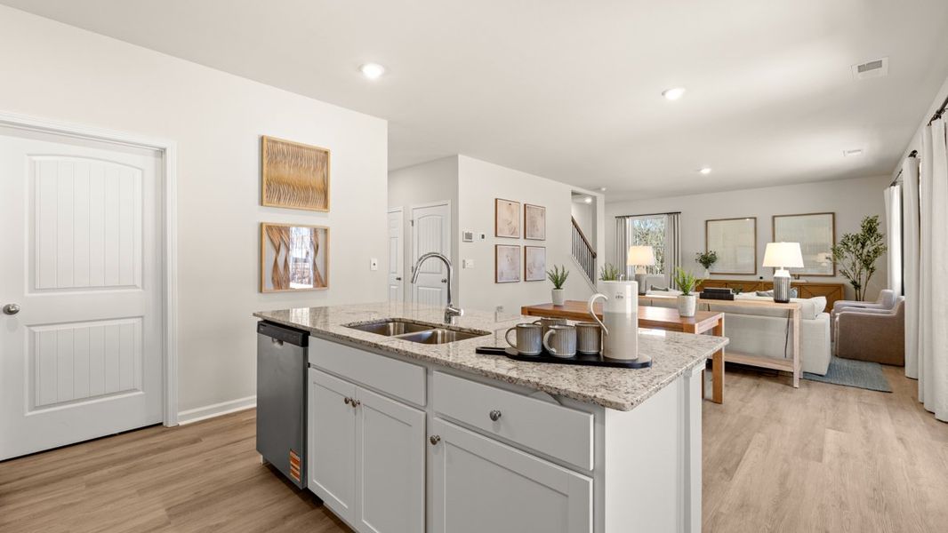 Furnished interior in a model home at South Wind in Fairburn (Image 8).