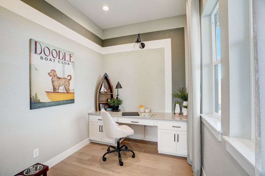 Furnished interior in a model home at Kitchel Lake at Serratoga Falls in Timnath (Image 39).