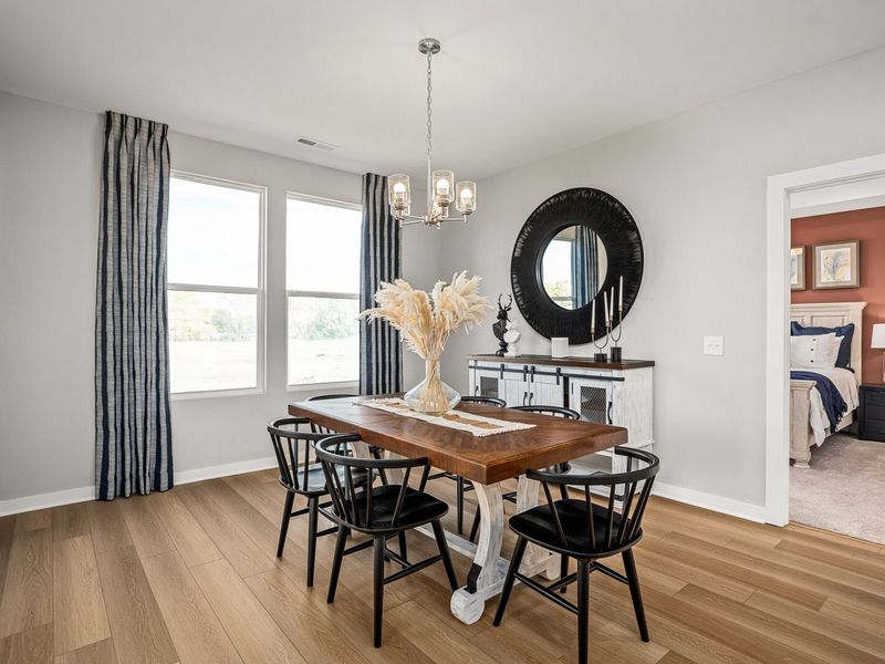 Furnished interior in a model home at Sage Farms in White House (Image 24).
