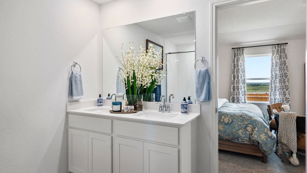 Furnished interior in a model home at Monarch Ranch in Manor (Image 24).