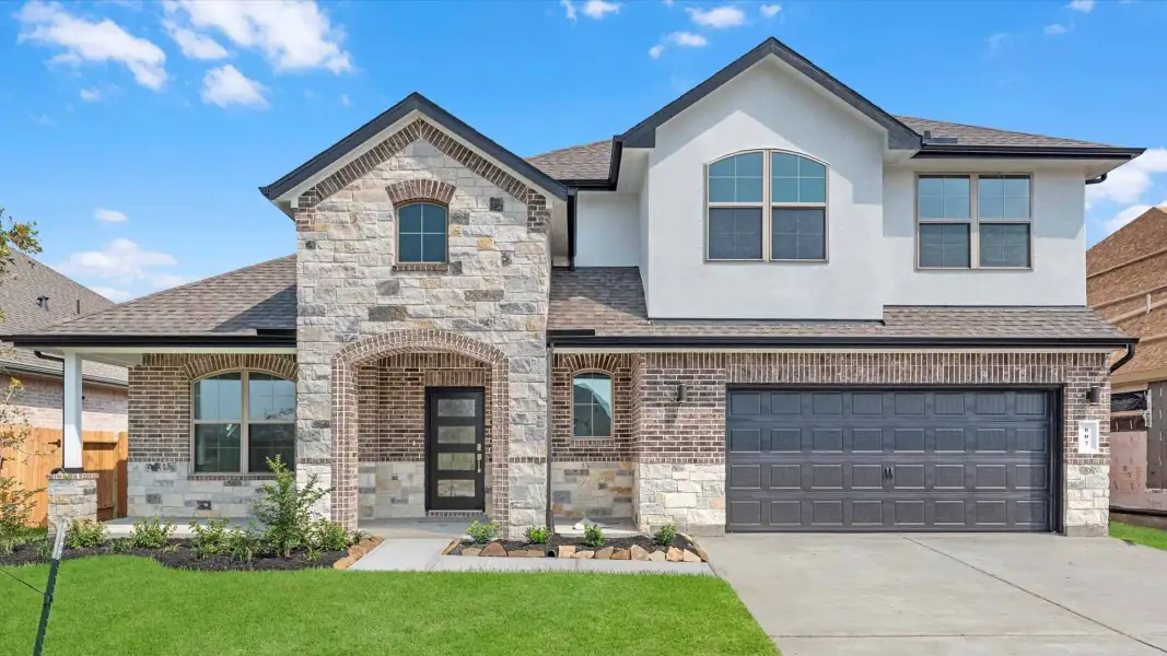 Front exterior of a home in the Lago Mar 60' Homesites community, located in Texas City, TX (Image 19).