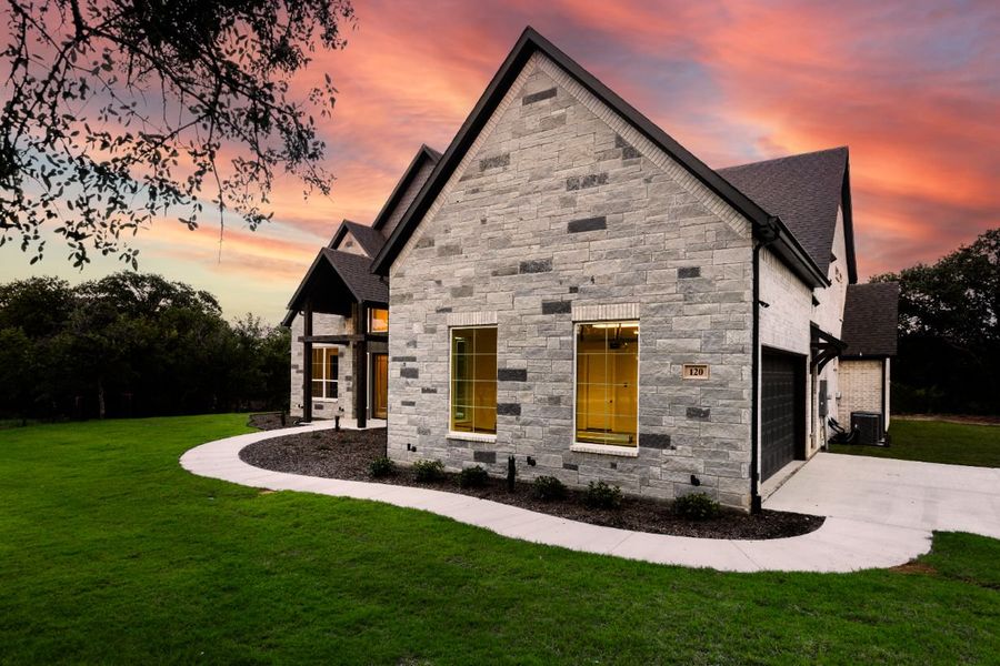 Front exterior of a home in the Lola Creek Ranch community, located in Boyd, TX (Image 18).