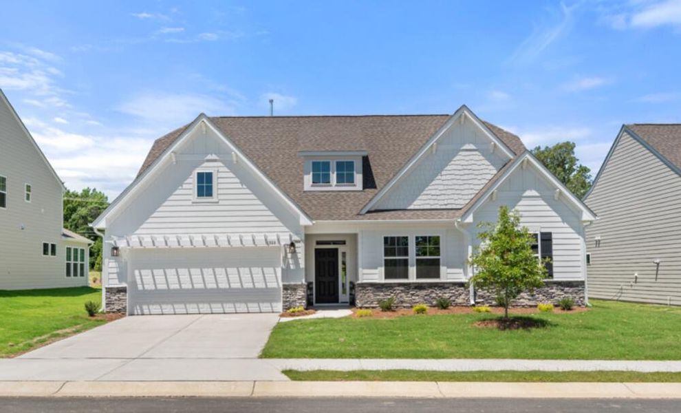 Front exterior of a home in the Arbordale Reserve community, located in Elgin, SC (Image 11). Front exterior of a home in the Arbordale Reserve community, located in Elgin, SC (Image 11).
