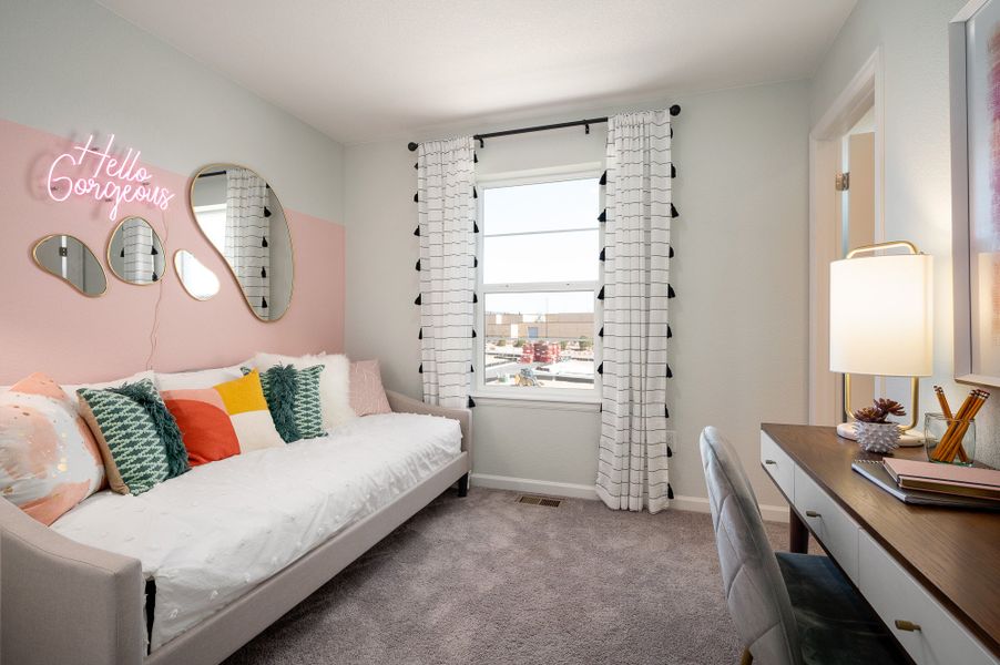 Furnished interior in a model home at The Commons at Victory Ridge in Colorado Springs (Image 15).