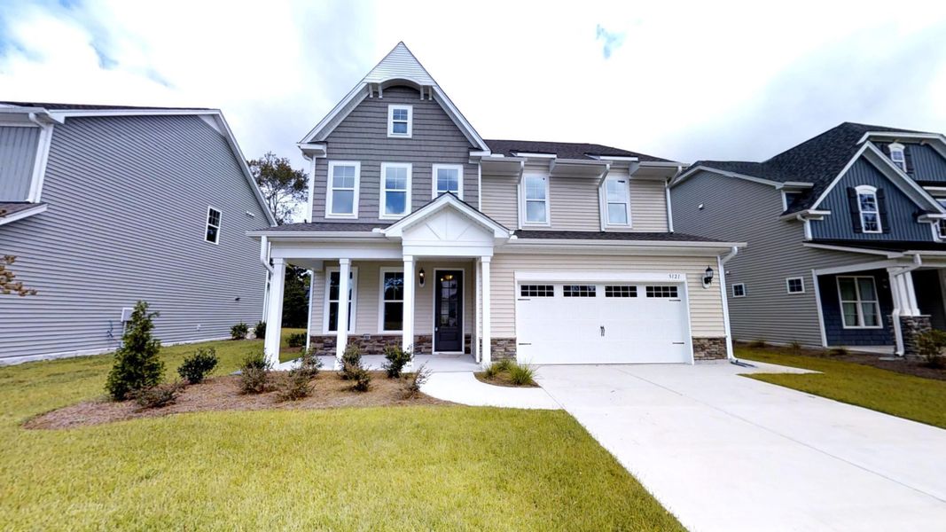 Front exterior of a home in the Laurenbridge - Robuck Homes community, located in Garner, NC (Image 6). Front exterior of a home in the Laurenbridge - Robuck Homes community, located in Garner, NC (Image 6).