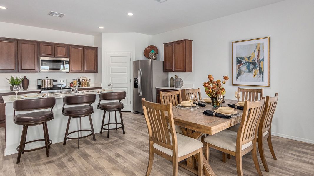 Furnished interior in a model home at Roadrunner Estates in Tucson (Image 15).