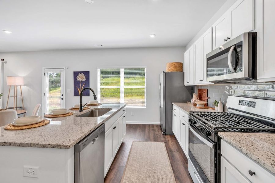 Furnished interior in a model home at Sweetlake Grove in Mableton (Image 5).