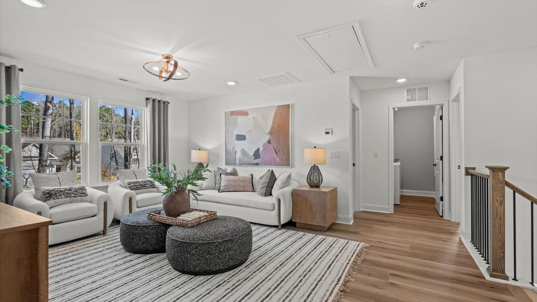 Furnished interior in a model home at Whispering Pines in Franklinton (Image 19).