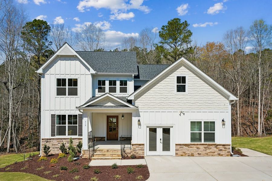 Front exterior of a home in the Magnolia Acres community, located in Fuquay Varina, NC (Image 1). Front exterior of a home in the Magnolia Acres community, located in Fuquay Varina, NC (Image 1).