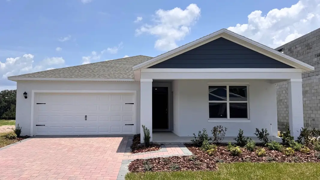 Front exterior of a home in the Sagewood community, located in Apopka, FL (Image 4).
