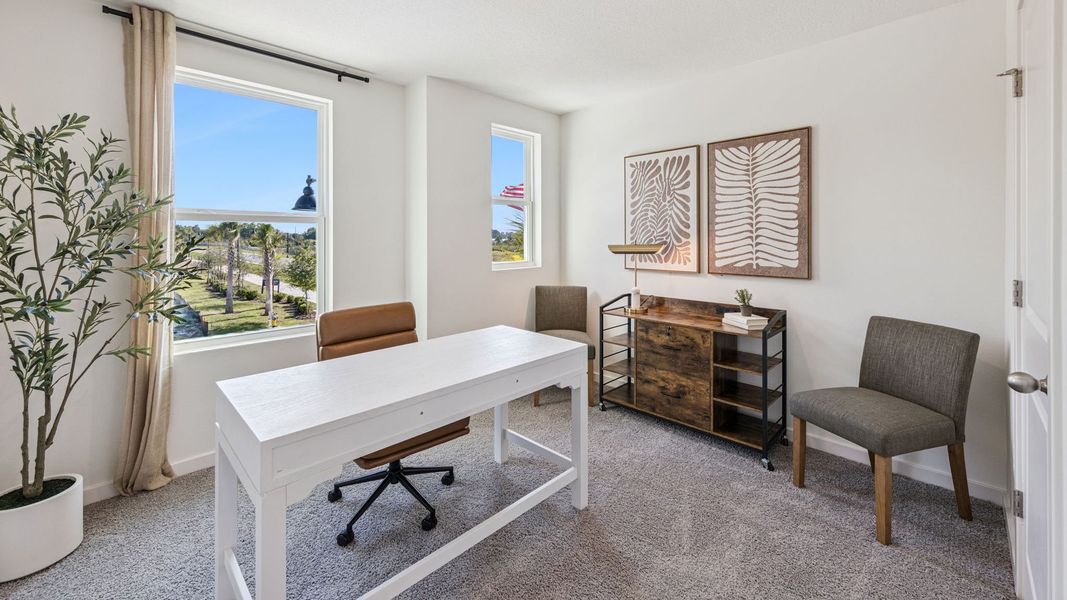 Furnished interior in a model home at Vineland Reserve in Osteen (Image 14).