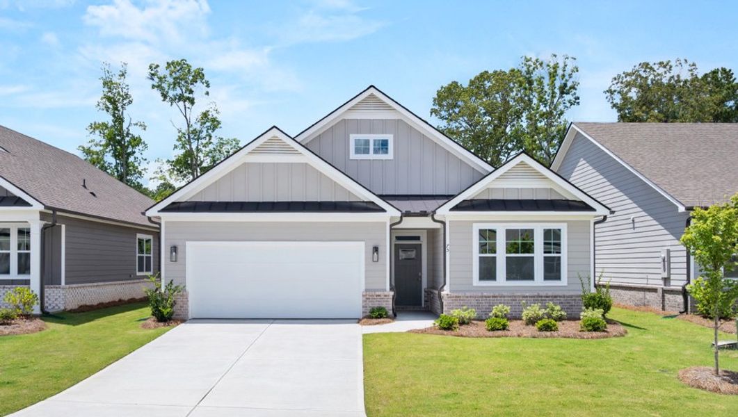 Front exterior of a home in the Hamptons at Riverwood North community, located in Dallas, GA (Image 5).