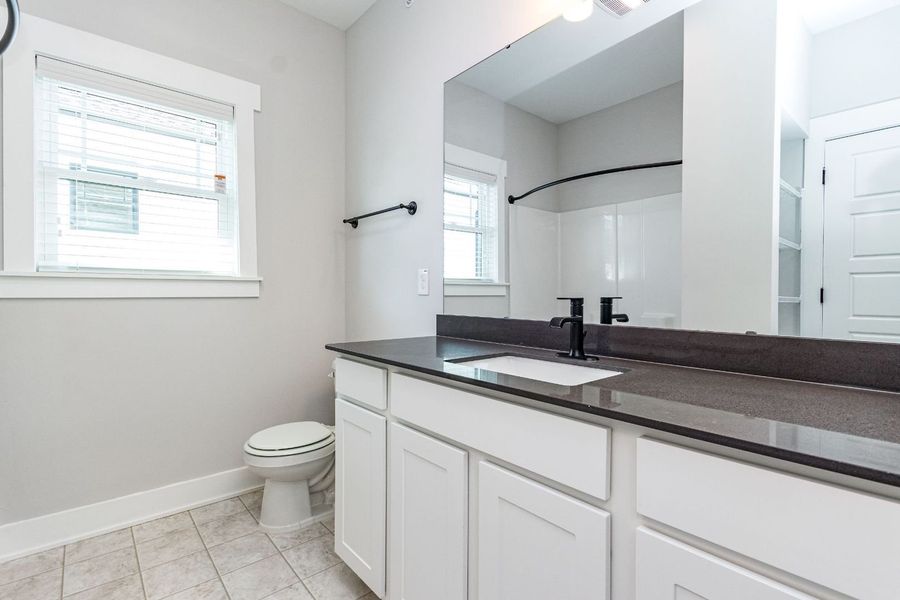 Furnished interior in a model home at Academy Overlook in Clayton (Image 5).