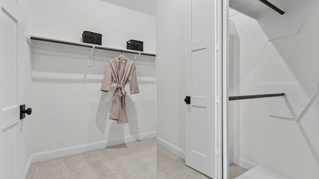 Furnished interior in a model home at Wildrye in Waller (Image 28).