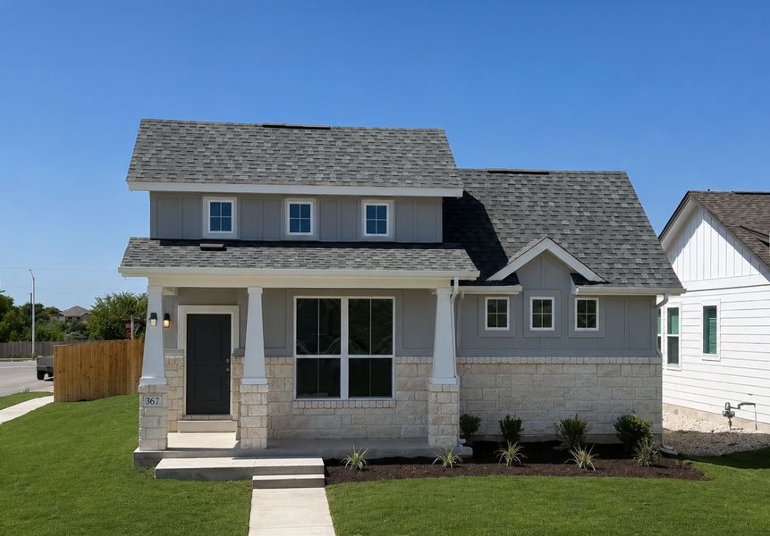 Front exterior of a home in the Porter Country community, located in Buda, TX (Image 13).