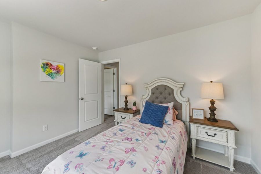 Furnished interior in a model home at The Hills at Cedar Creek in Winder (Image 65).