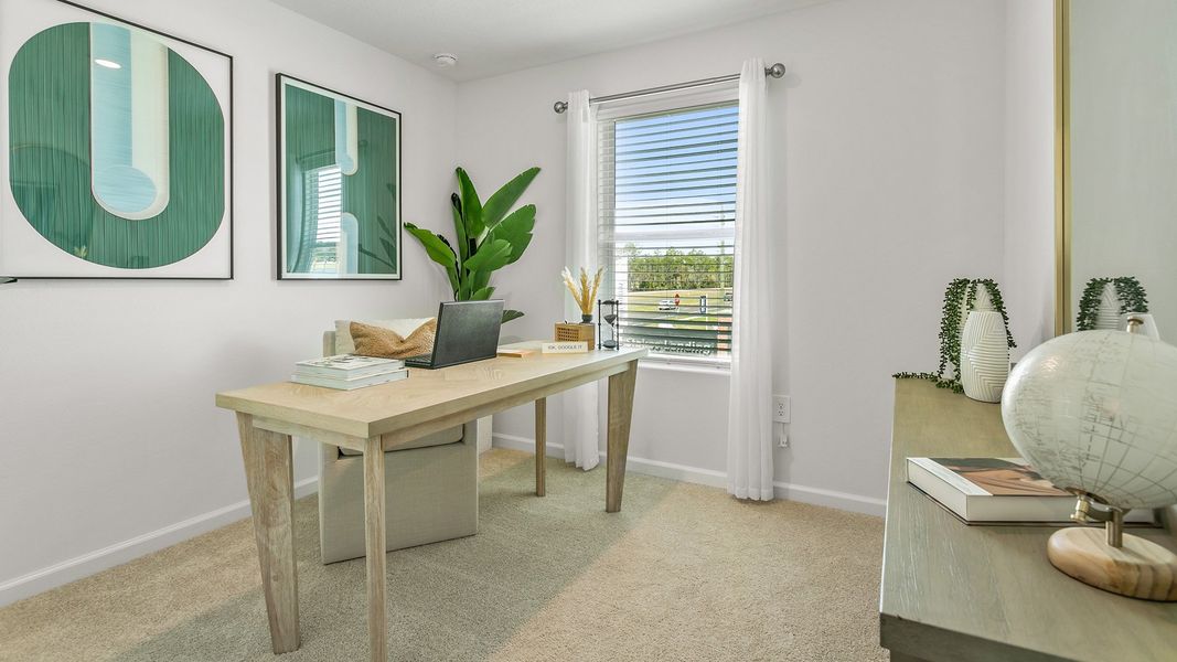 Furnished interior in a model home at Stokes Landing in St. Augustine (Image 22).