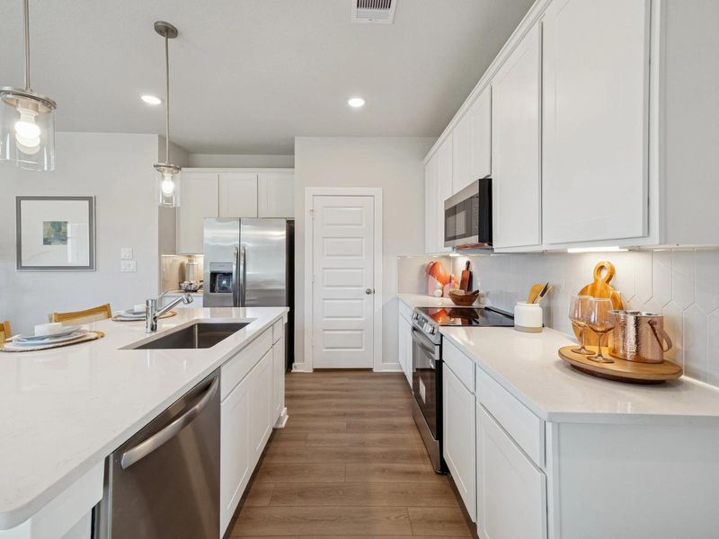 Furnished interior in a model home at Spring Branch Crossing in Conroe (Image 9).