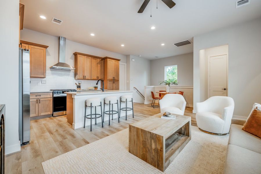 Furnished interior in a model home at Highland Gardens in Houston (Image 20).