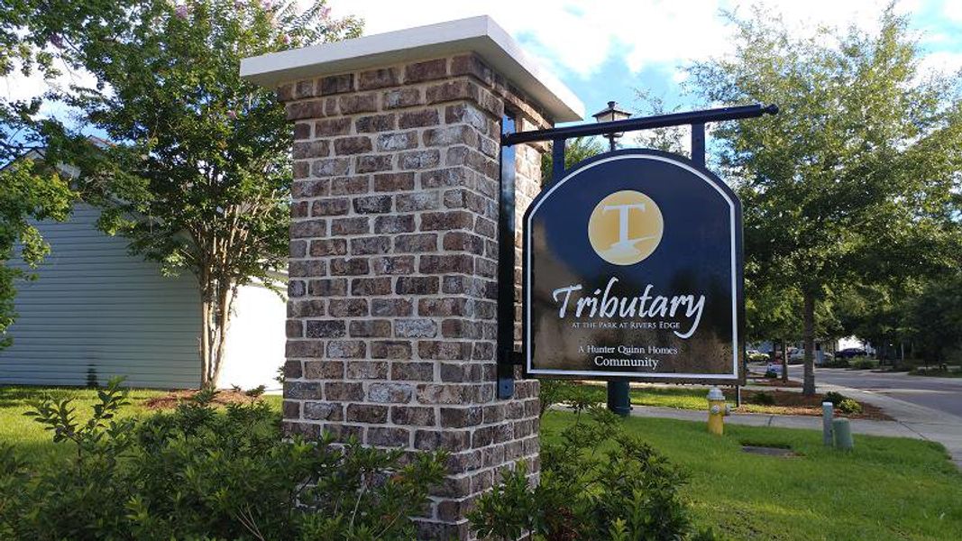 Entrance to the Tributary III at The Park at Rivers Edge community in North Charleston, SC, featuring signage and landscaping (Image 1). Entrance to the Tributary III at The Park at Rivers Edge community in North Charleston, SC, featuring signage and landscaping (Image 1).