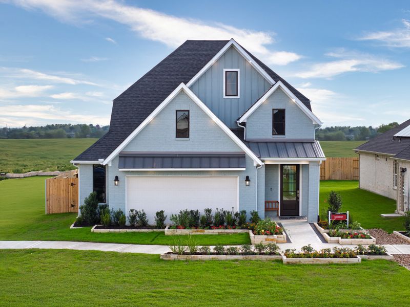 Front exterior of a home in the Ellwood: Heritage Collection community, located in Iowa Colony, TX (Image 12).