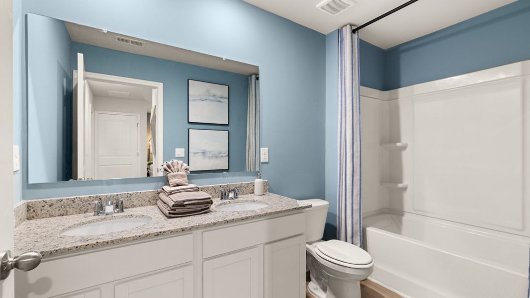 Furnished interior in a model home at Oconee Overlook Townhomes in Gainesville (Image 24).