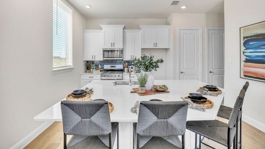 Furnished interior in a model home at The Avenue in Allen (Image 5).