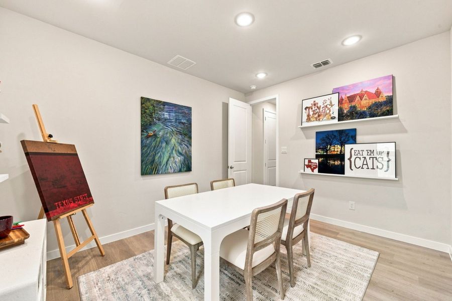 Furnished interior in a model home at La Cima in San Marcos (Image 28).
