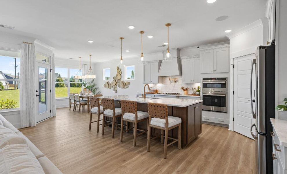 Furnished interior in a model home at The Enclave at Hidden Lake - 55+ Community in Youngsville (Image 8).