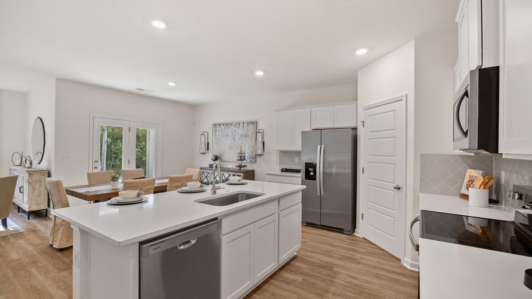 Furnished interior in a model home at Cottages at Blue Ridge in Bonaire (Image 7).