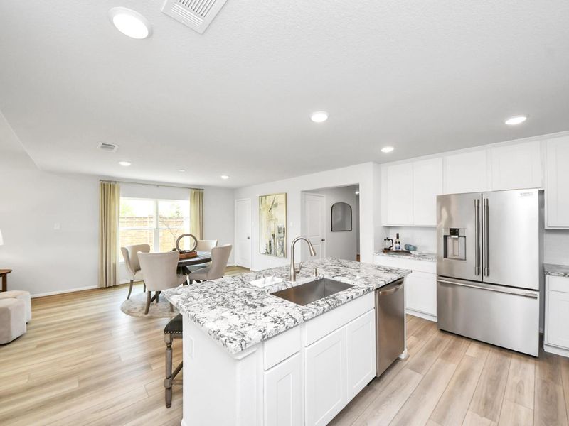 Furnished interior in a model home at Sunterra in Katy (Image 14).