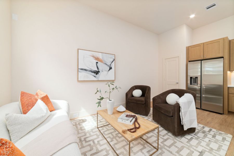 Furnished interior in a model home at Rachel Reserve in Houston (Image 14).