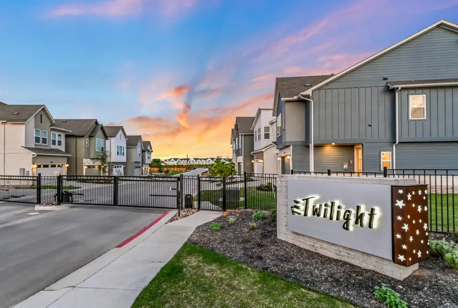 Entrance to the The Twilight at Goodnight Ranch community in Austin, TX, featuring signage and landscaping (Image 1).