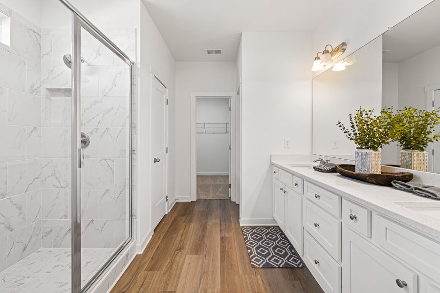 Furnished interior in a model home at Sutton’s Landing in Statham (Image 30).
