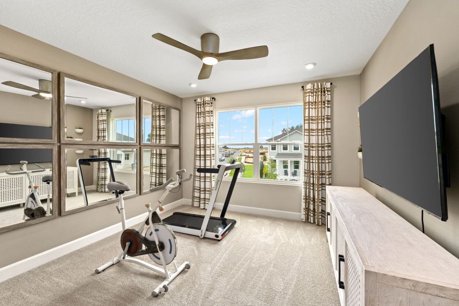 Furnished interior in a model home at Rainwood in Clermont (Image 18).