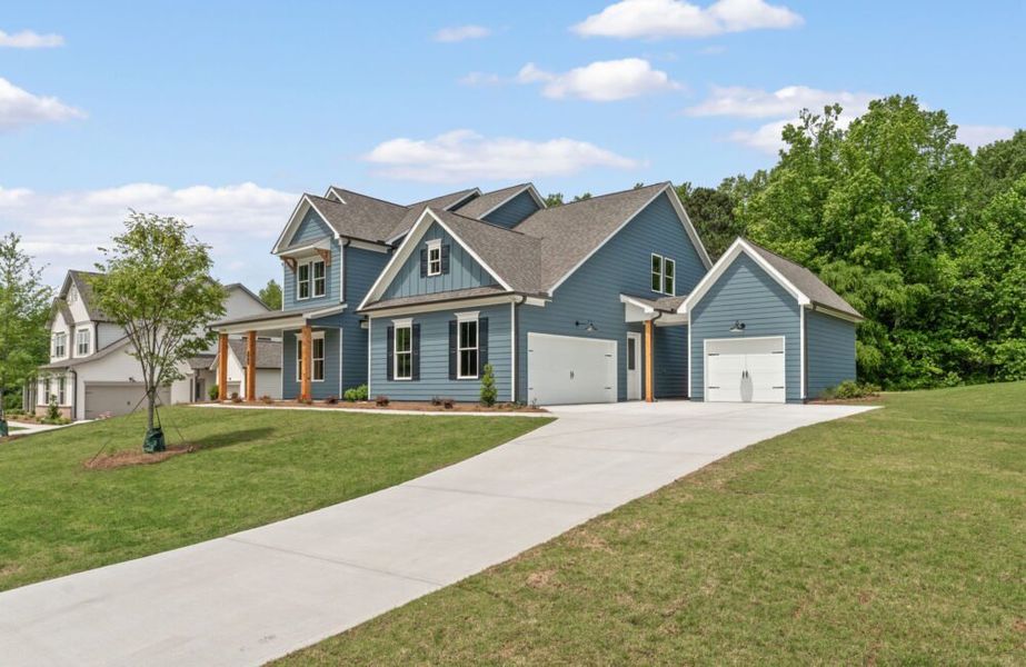 Front exterior of a home in the The Reserve at Knollwood community, located in Canton, GA (Image 11).