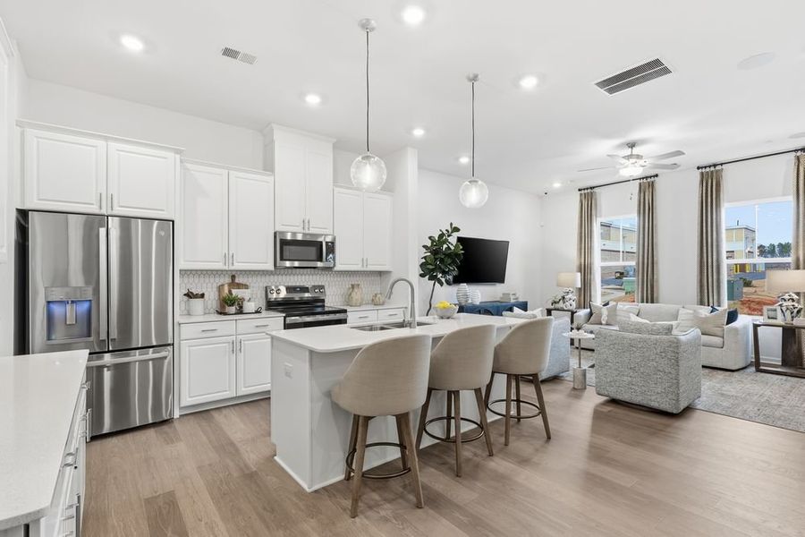 Furnished interior in a model home at Terraces at the Exchange in Indian Land (Image 2).