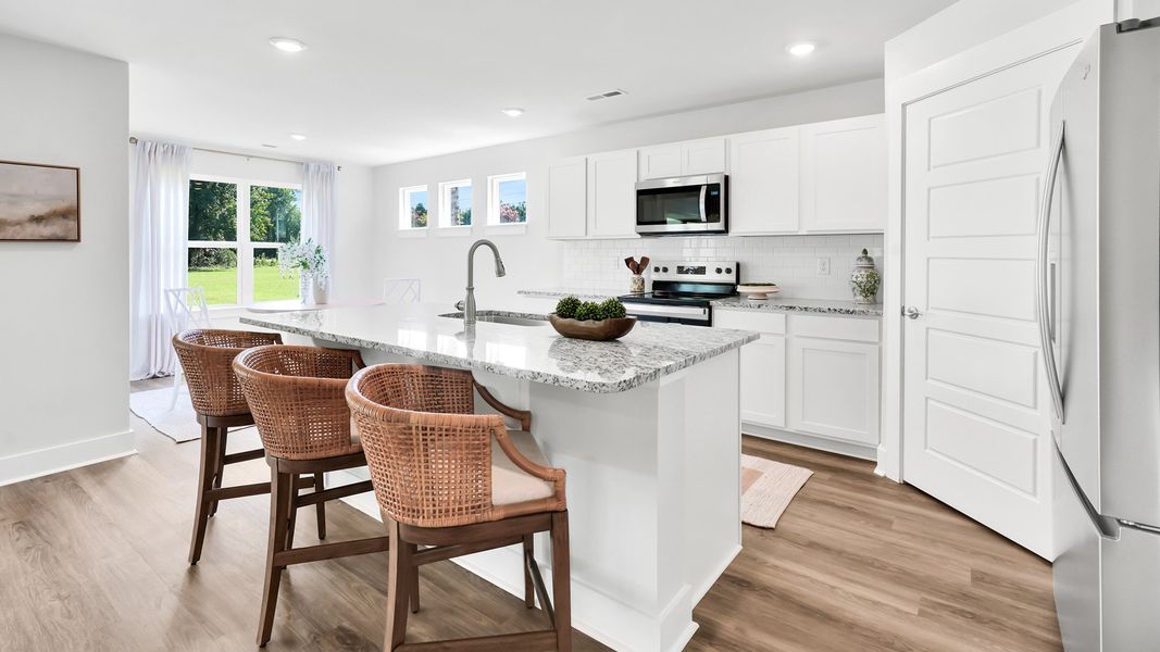Furnished interior in a model home at Merchant Point in Jacksonville (Image 4).