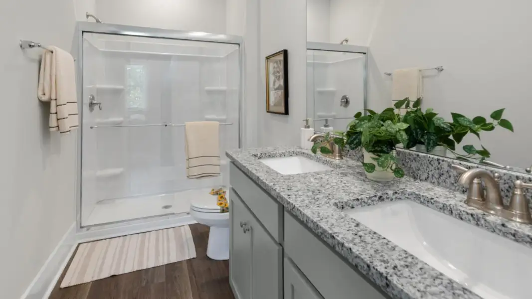 Furnished interior in a model home at The Retreat at Indigo Preserve Townhomes in Leland (Image 31).