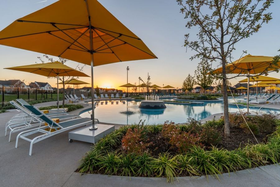 Shade umbrellas around lazy river in Mosaic, Celina, Texas