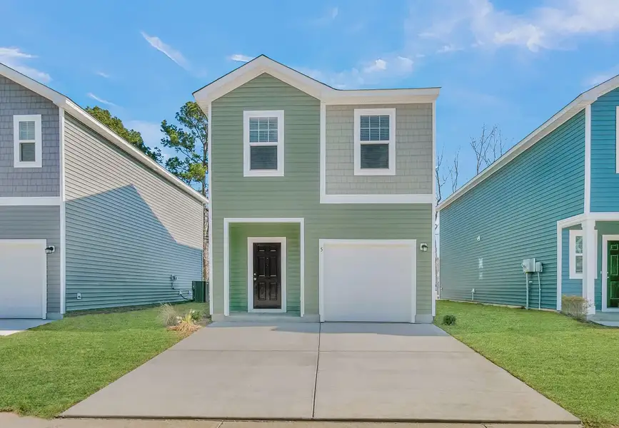 Front exterior of a home in the Pinckney Place community, located in North Charleston, SC (Image 9).