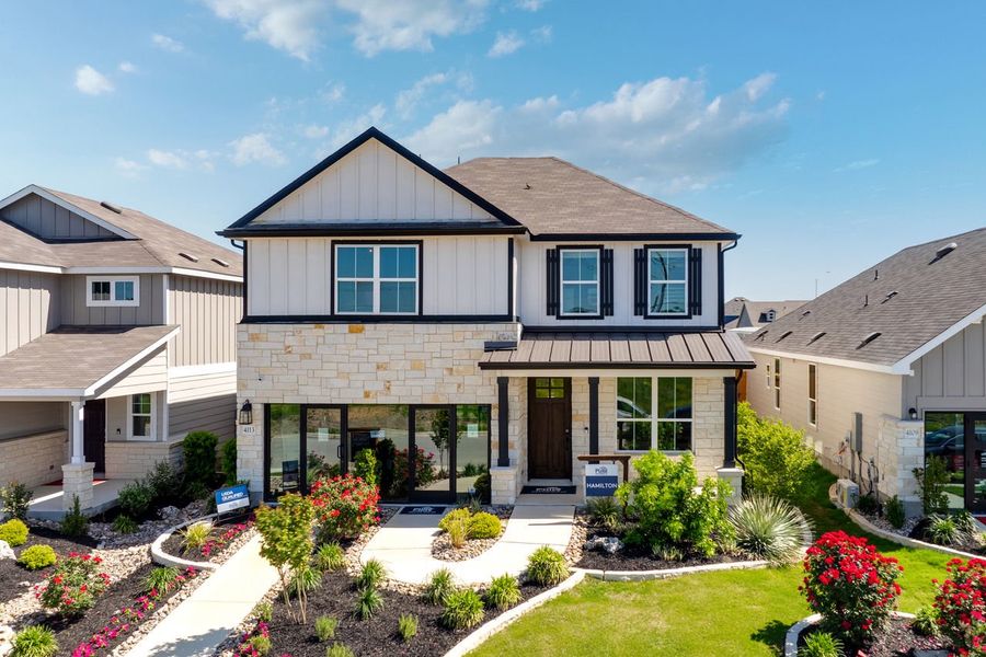 Exterior of model home in Lily Springs new construction community in Seguin, Texas
