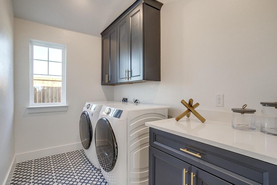 Furnished interior in a model home at MidTowne in Midlothian (Image 47).