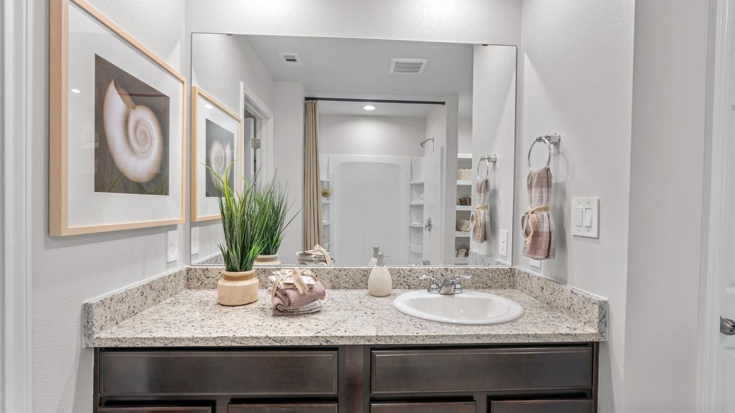 Furnished interior in a model home at The Cottages in Corpus Christi (Image 24).