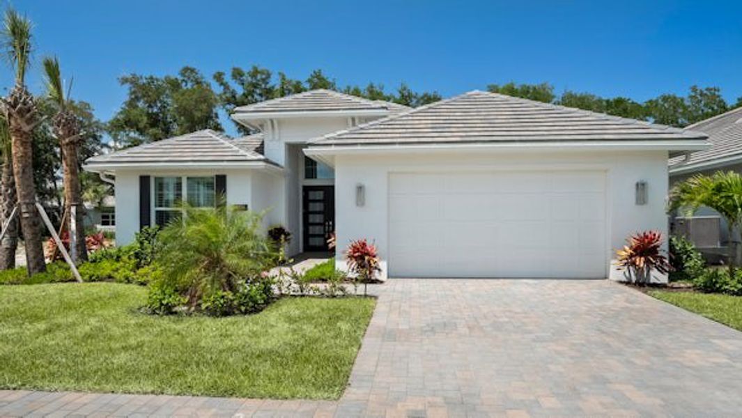 Front exterior of a home in the Lucaya Pointe community, located in Vero Beach, FL (Image 37).
