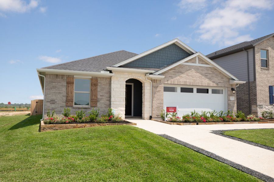 Front exterior of a home in the Laurel Landing: Founders Collection community, located in Alvin, TX (Image 8). Front exterior of a home in the Laurel Landing: Founders Collection community, located in Alvin, TX (Image 8).
