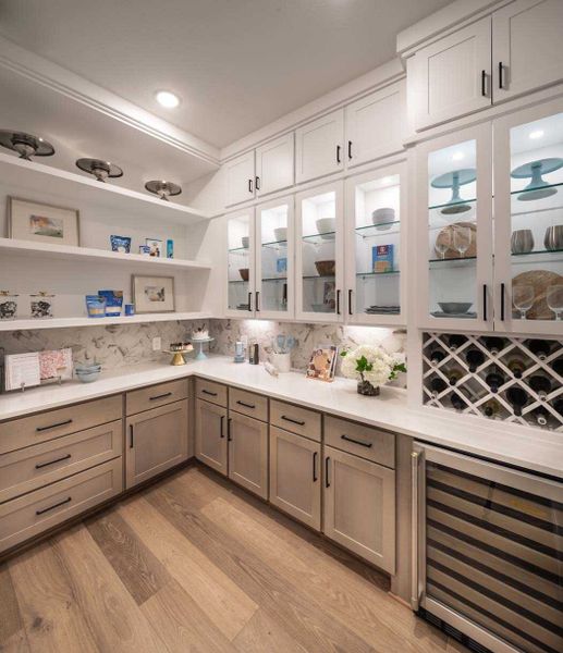 Furnished interior in a model home at Fulbrook on Fulshear Creek: 60ft. lots in Fulshear (Image 37).