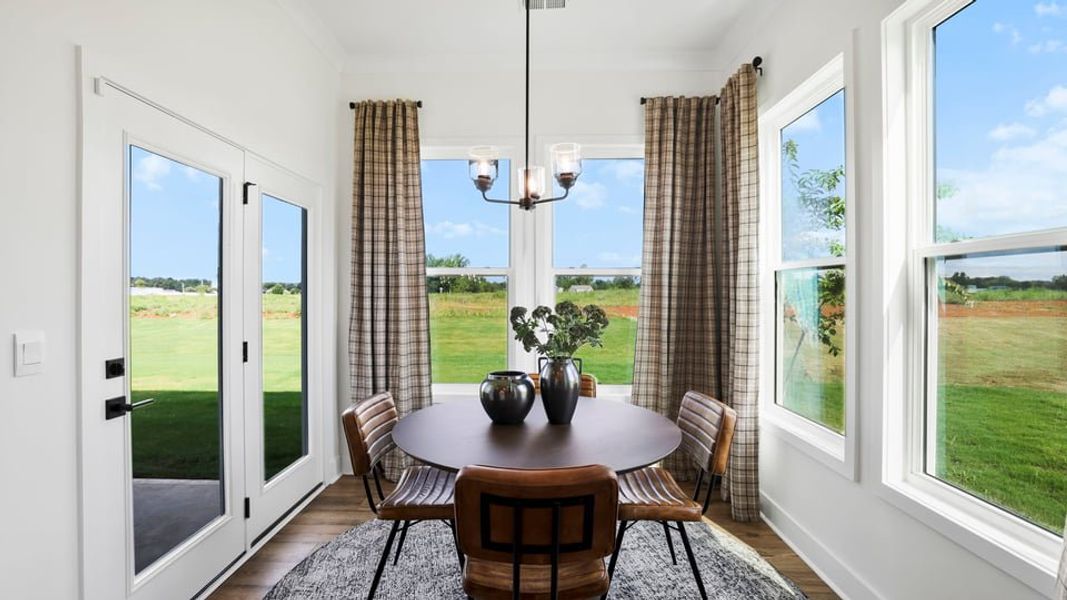 Furnished interior in a model home at Williams Ridge in Woodruff (Image 17).